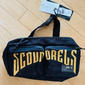Star Wars Scoundrels utility sling bag with luggage handle slot. Brand new.
